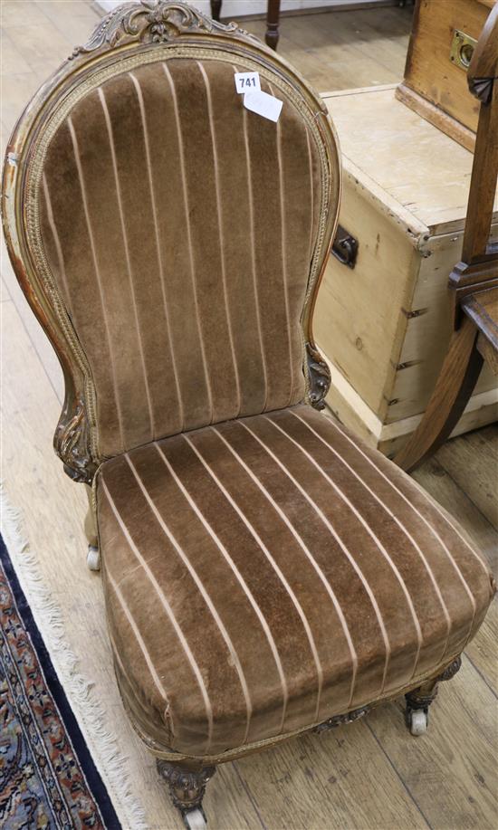 A Victorian giltwood nursing chair